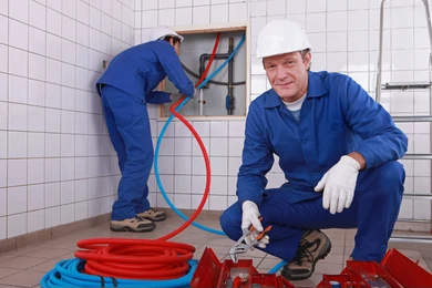 stock image of a team of plumbers